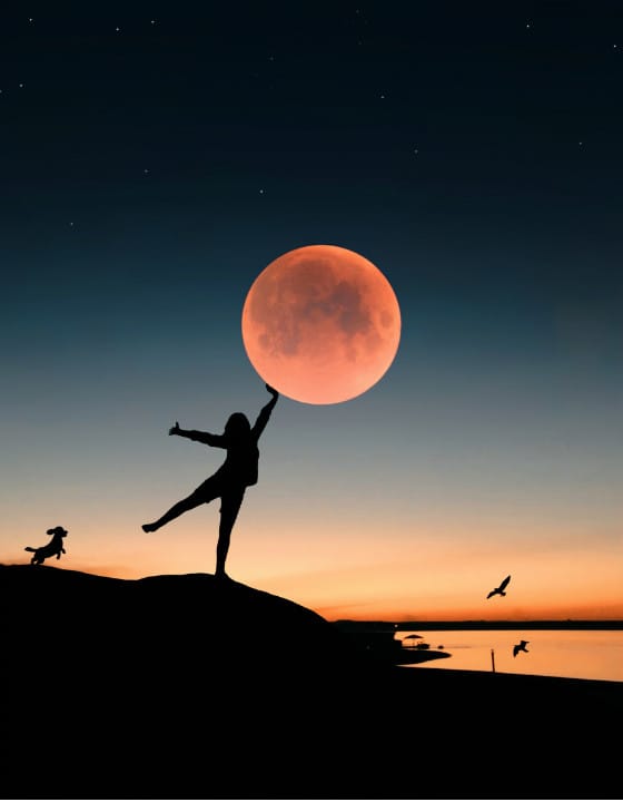 Woman touching the moon