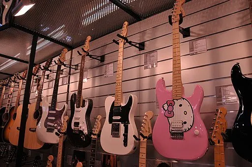 Wall of Squier guitars