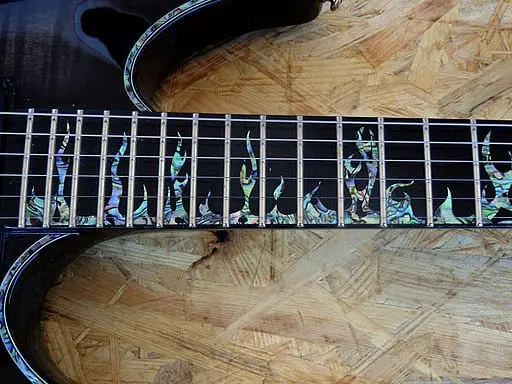 decorative inlay flames on a guitar
