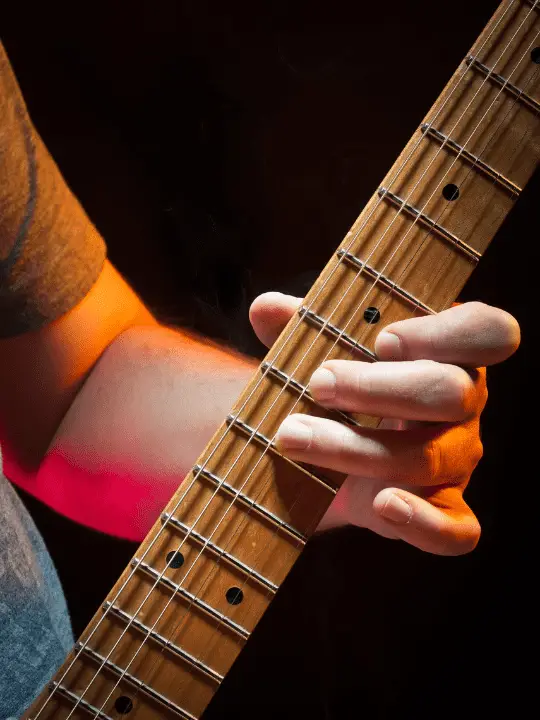 What are the dots on a guitar? They help you learn the notes.