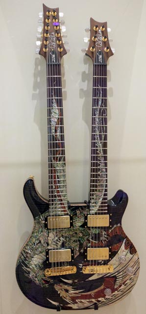 A double-neck electric guitar.