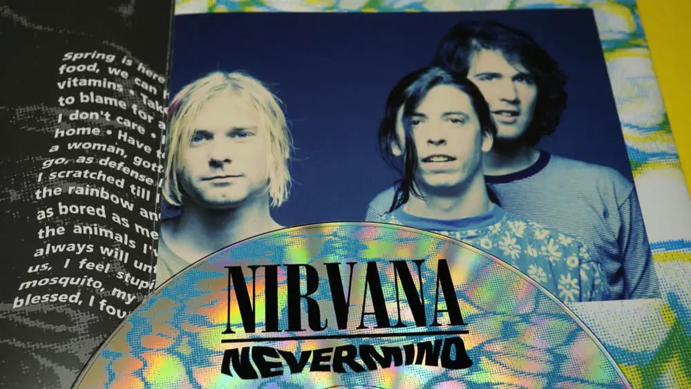 Nirvanarck band in a magazine with their Nevermind album over it