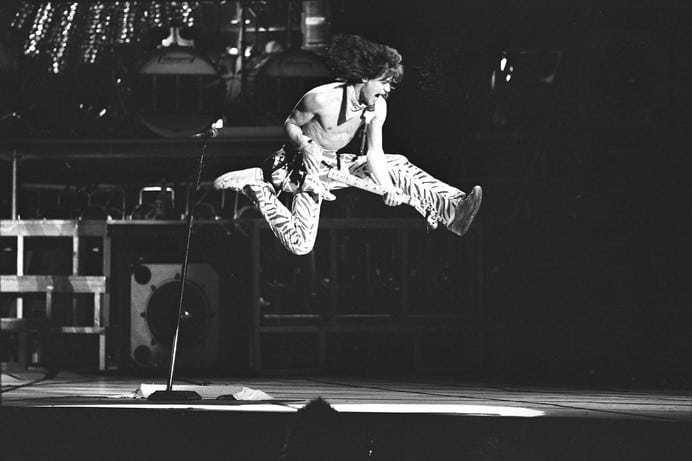 Eddie Van Halen jumping on stage