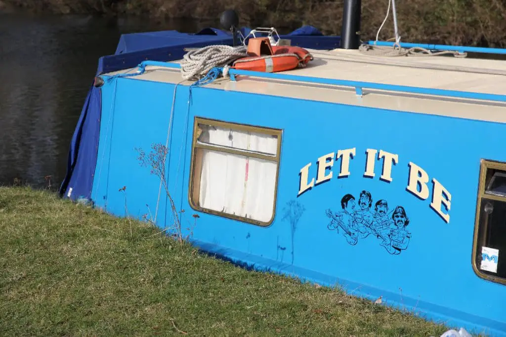 A truck with a "Let It Be" drawing on it